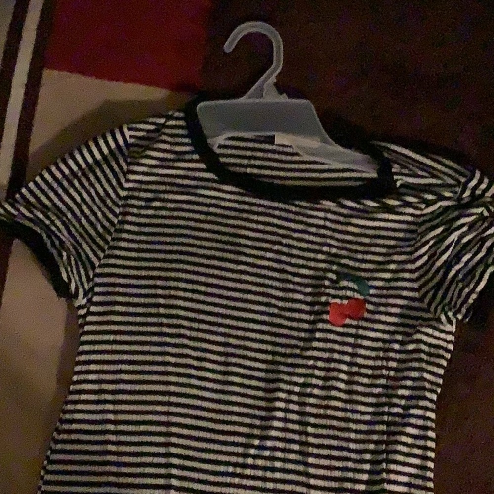 A black and White striped shirt with cherry.